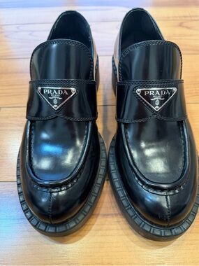 Prada Black Patent Leather Women Slip-On Loafers with Triangular Logo